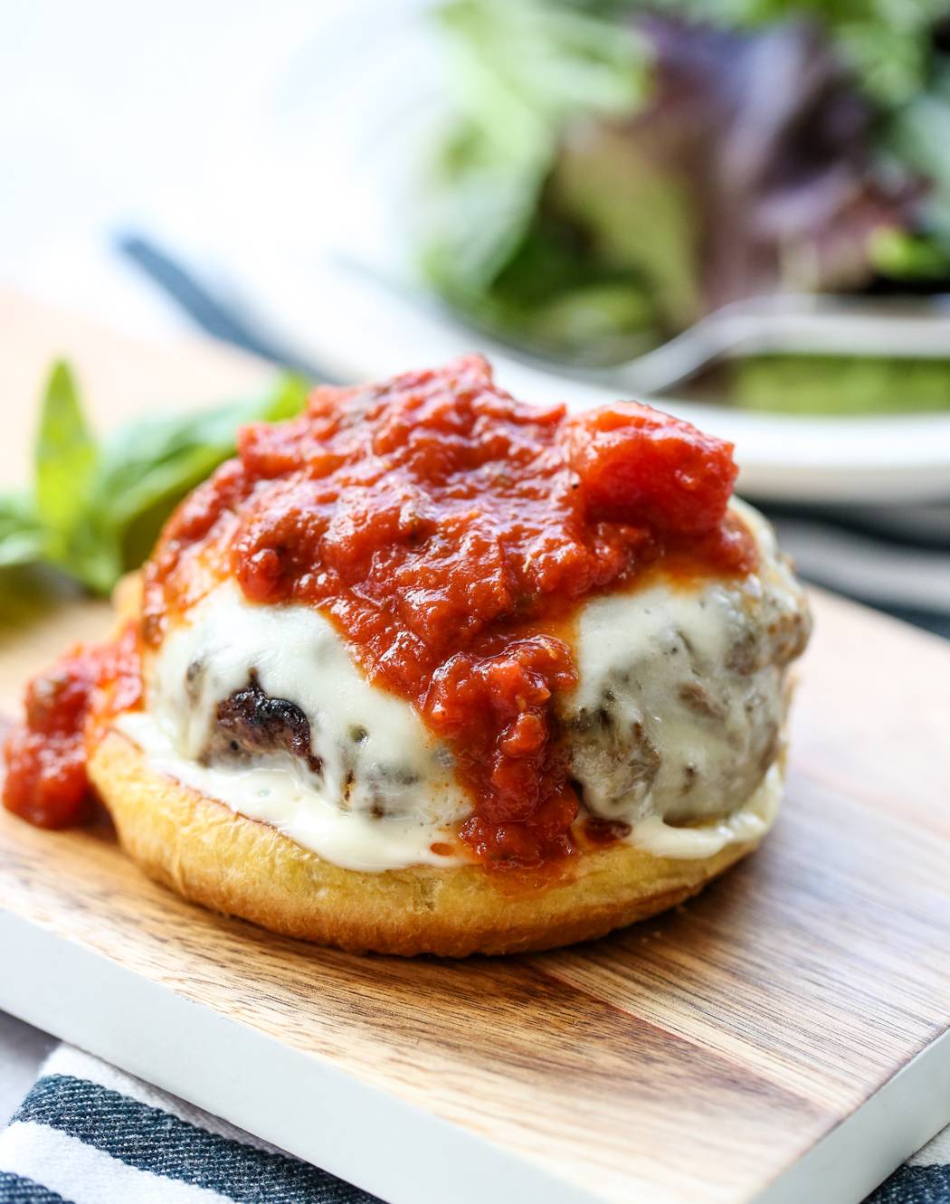 Italian Burger on platter with marinara