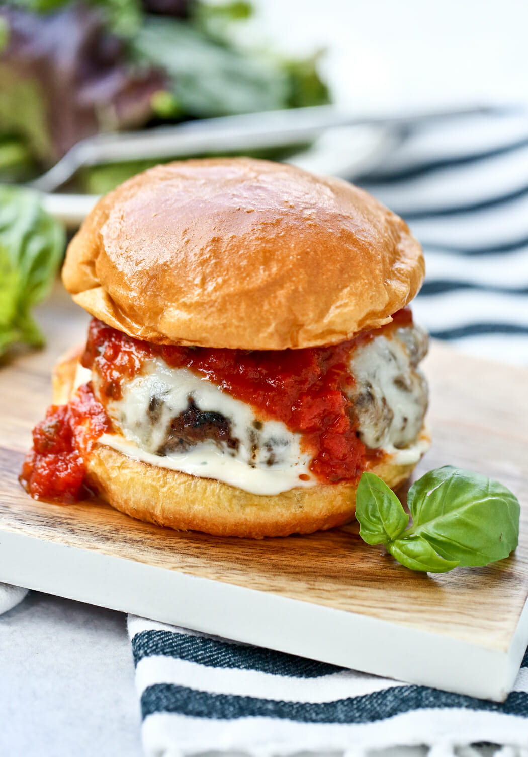 italian burger on cutting board