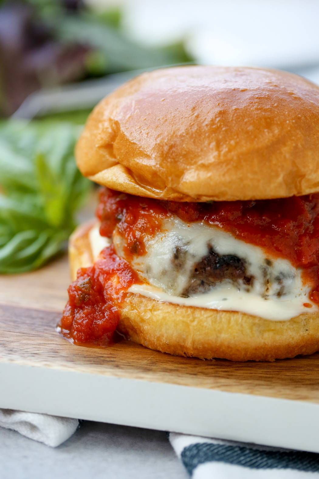marinara and cheese on burger