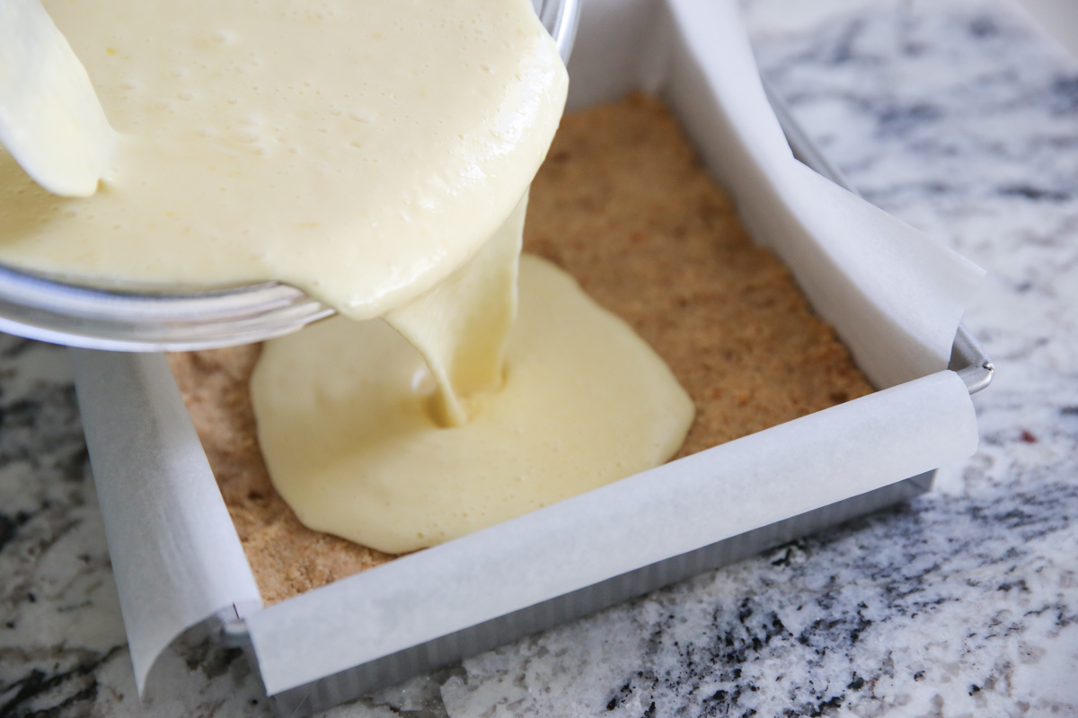 pouring batter onto crust