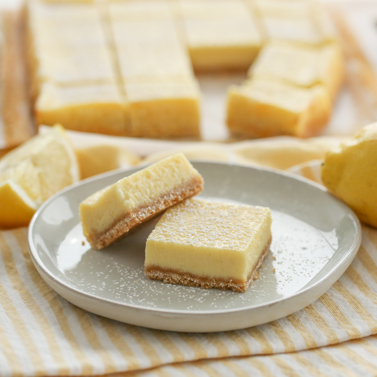 Creamy Lemon Bars on a serving plate