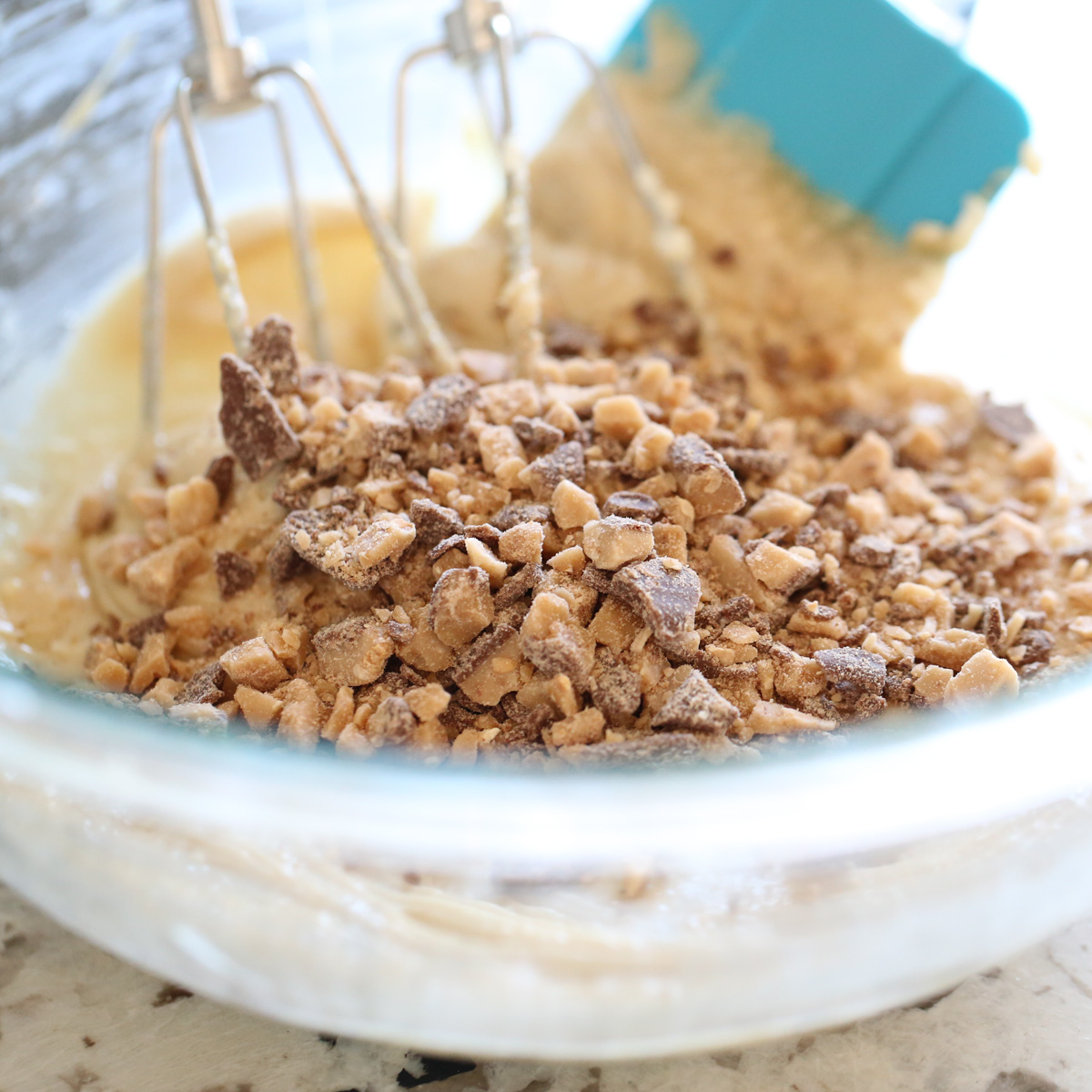 caramel toffee dip ingredients in a mixing bowl