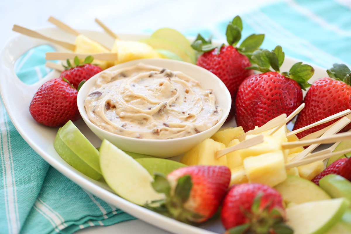 caramel dip on a platter with fruit