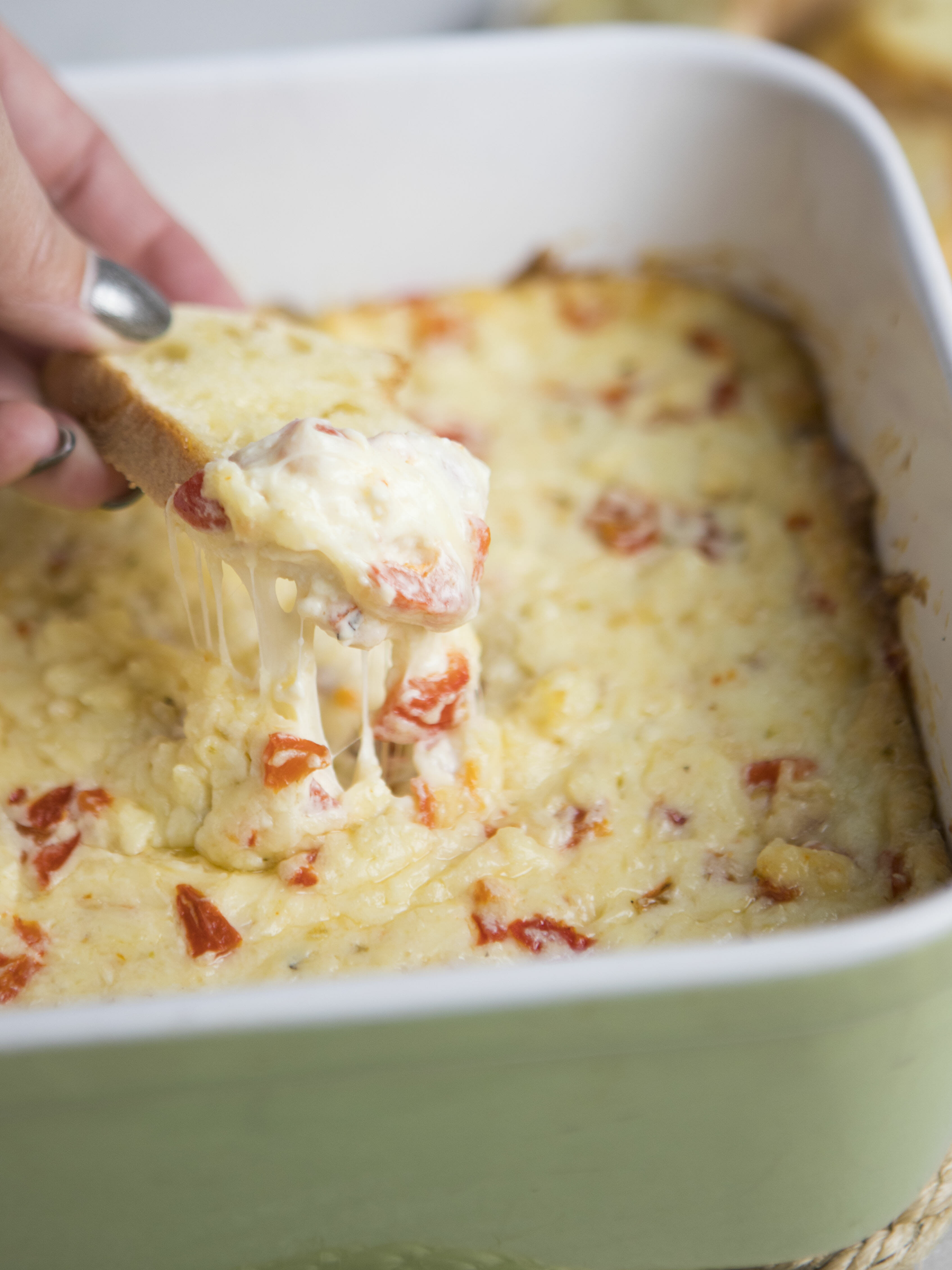 roasted red pepper dip on baguette