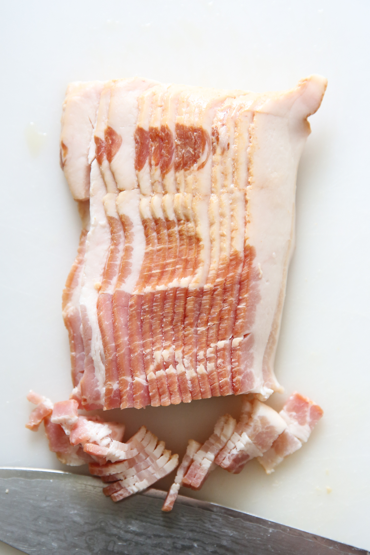 chopped bacon on a cutting board
