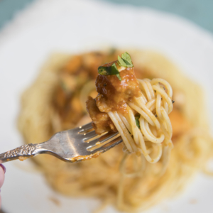 Twirled pasta on fork