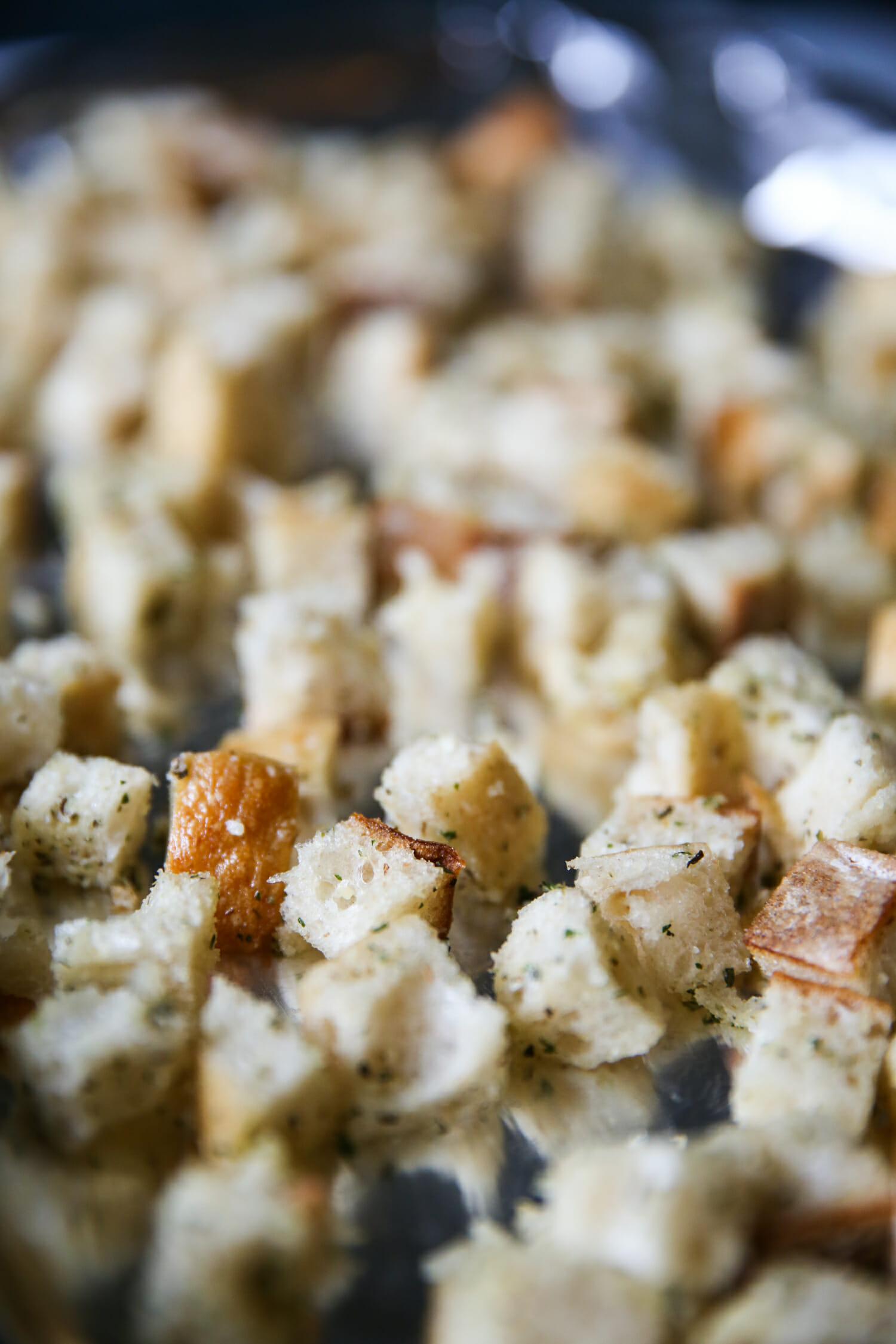 homemade sourdough garlic-herb croutons from our best bites