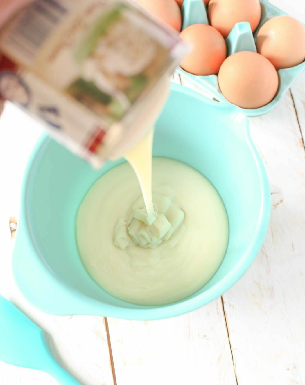 adding sweetened condensed milk to key lime pie from Our Best Bites