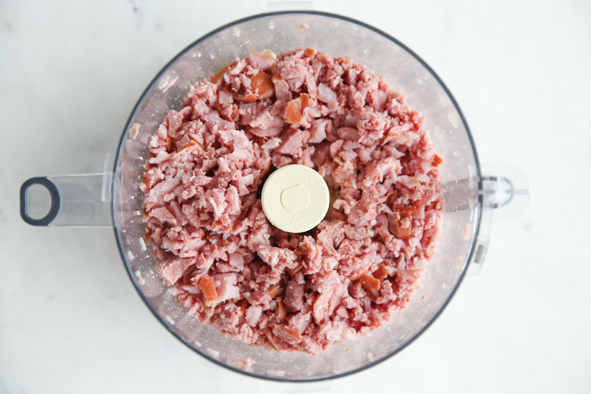 sausage and ham in a food processor, crumbled up a bit