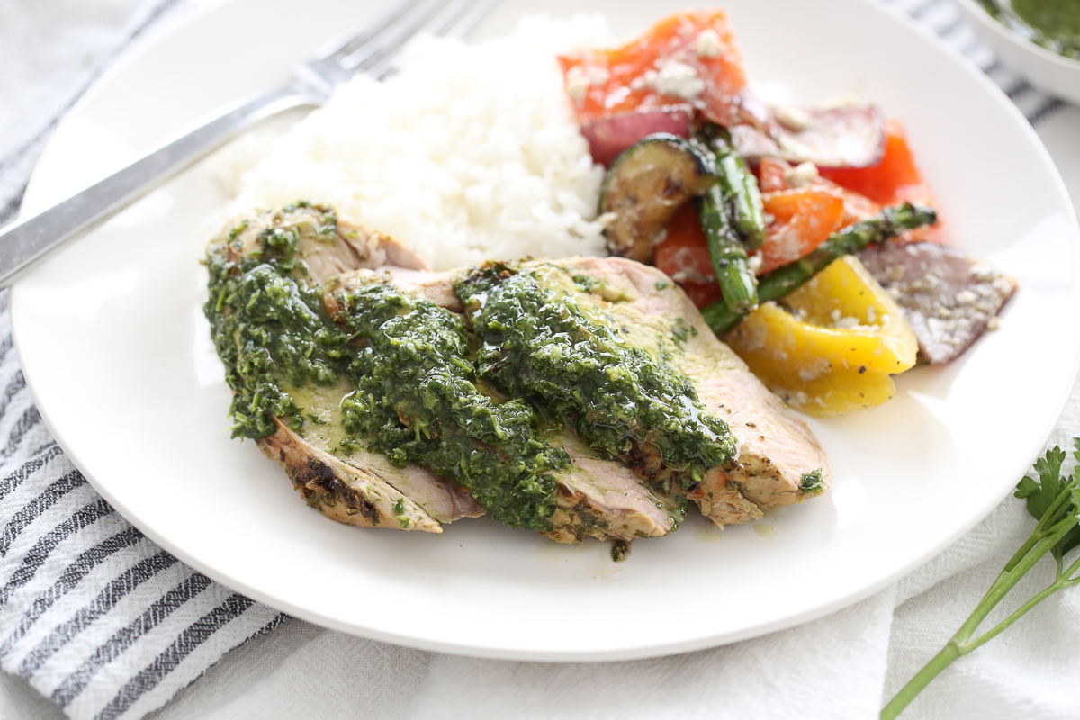 sliced pork tenderloin with rice and veggies