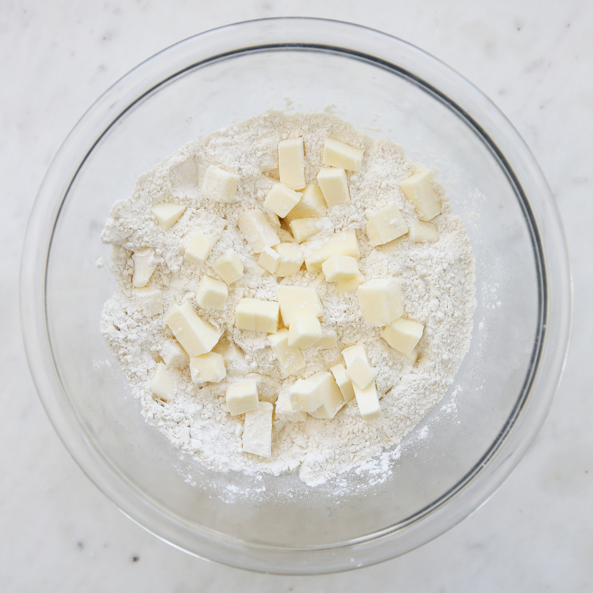 making pie dough in a glass bowl 