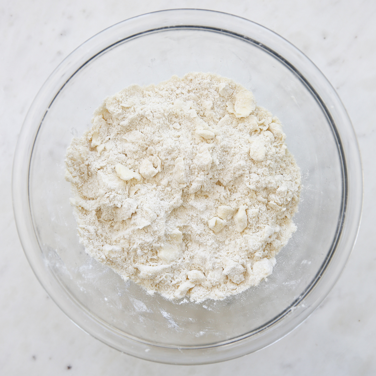 making pie dough in a glass bowl 