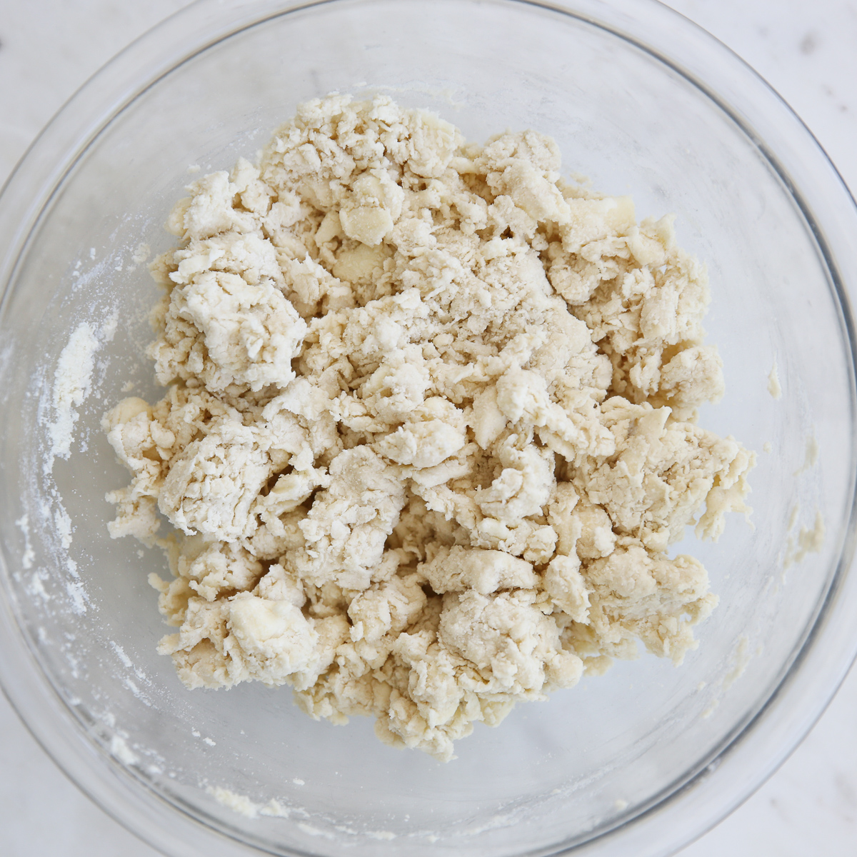 making pie dough in a glass bowl 