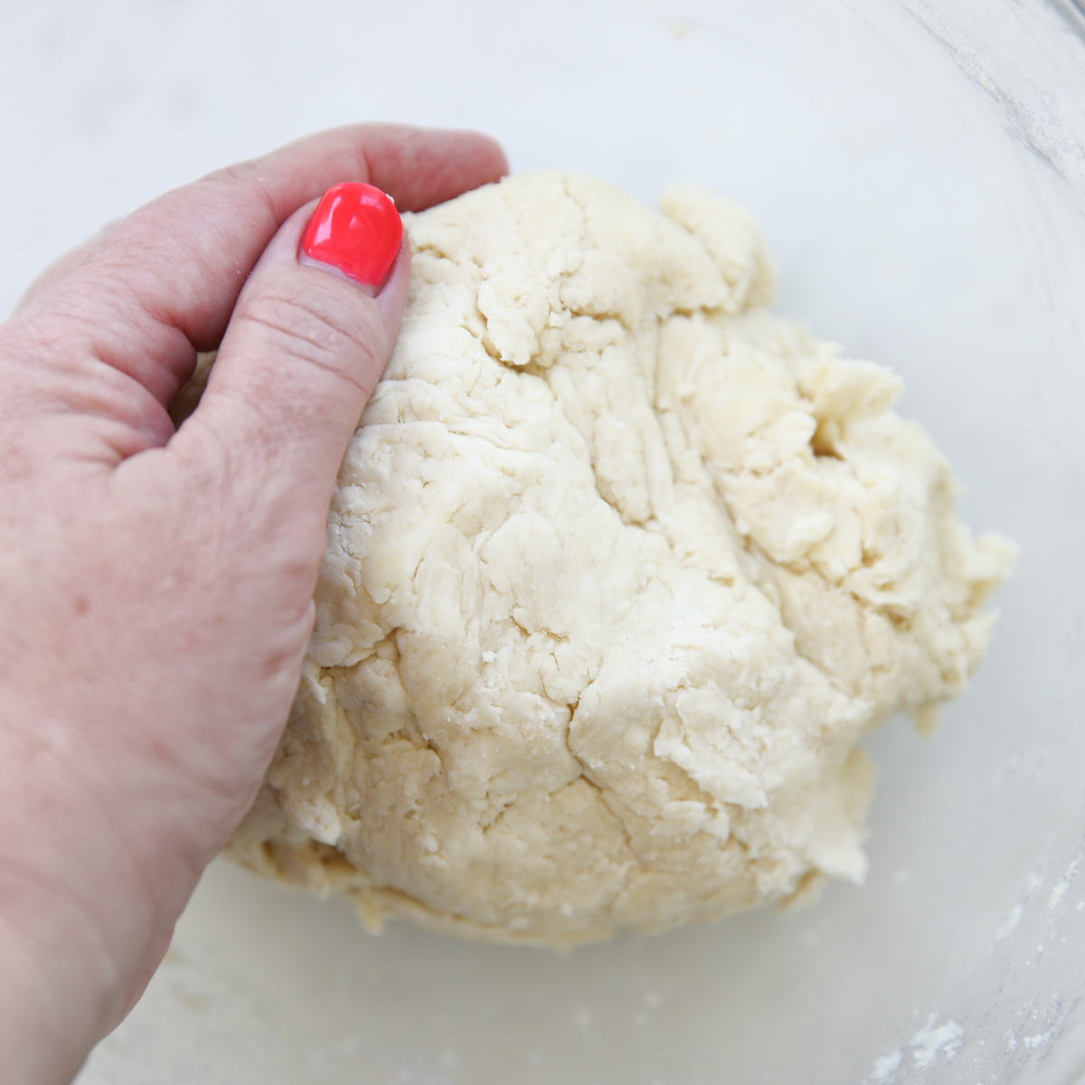 making pie dough in a glass bowl 