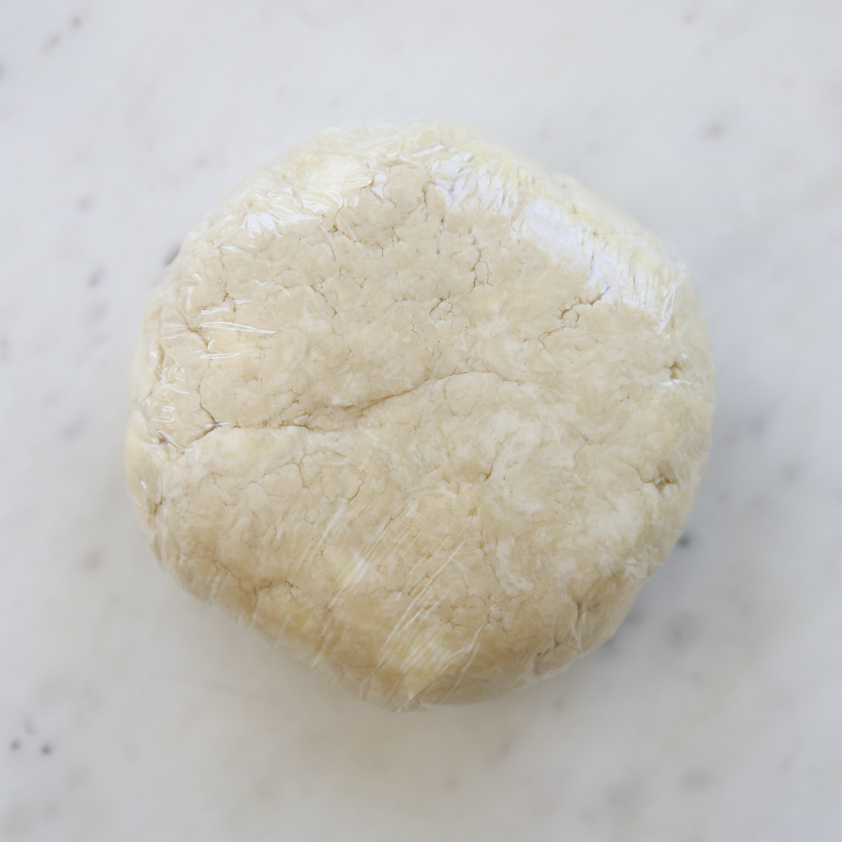 pie dough wrapped in plastic wrap