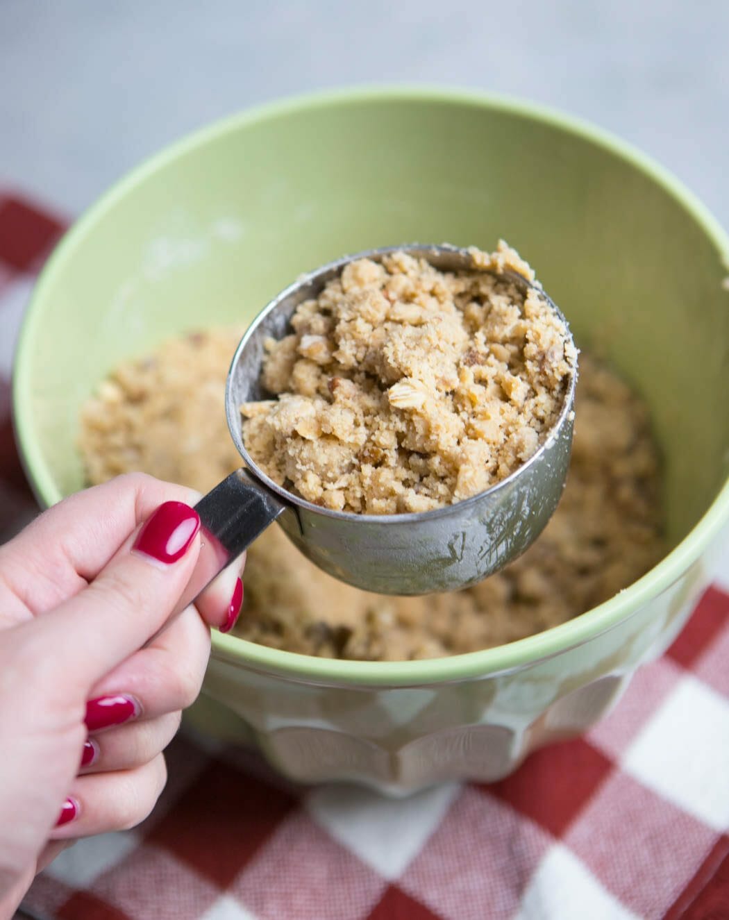 Crumb Topped Apple Pie topping in a measuring cup from Our Best Bites