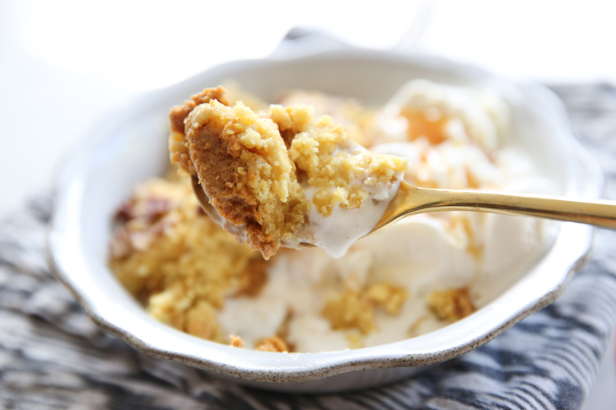 pumpkin dump cake on a spoon