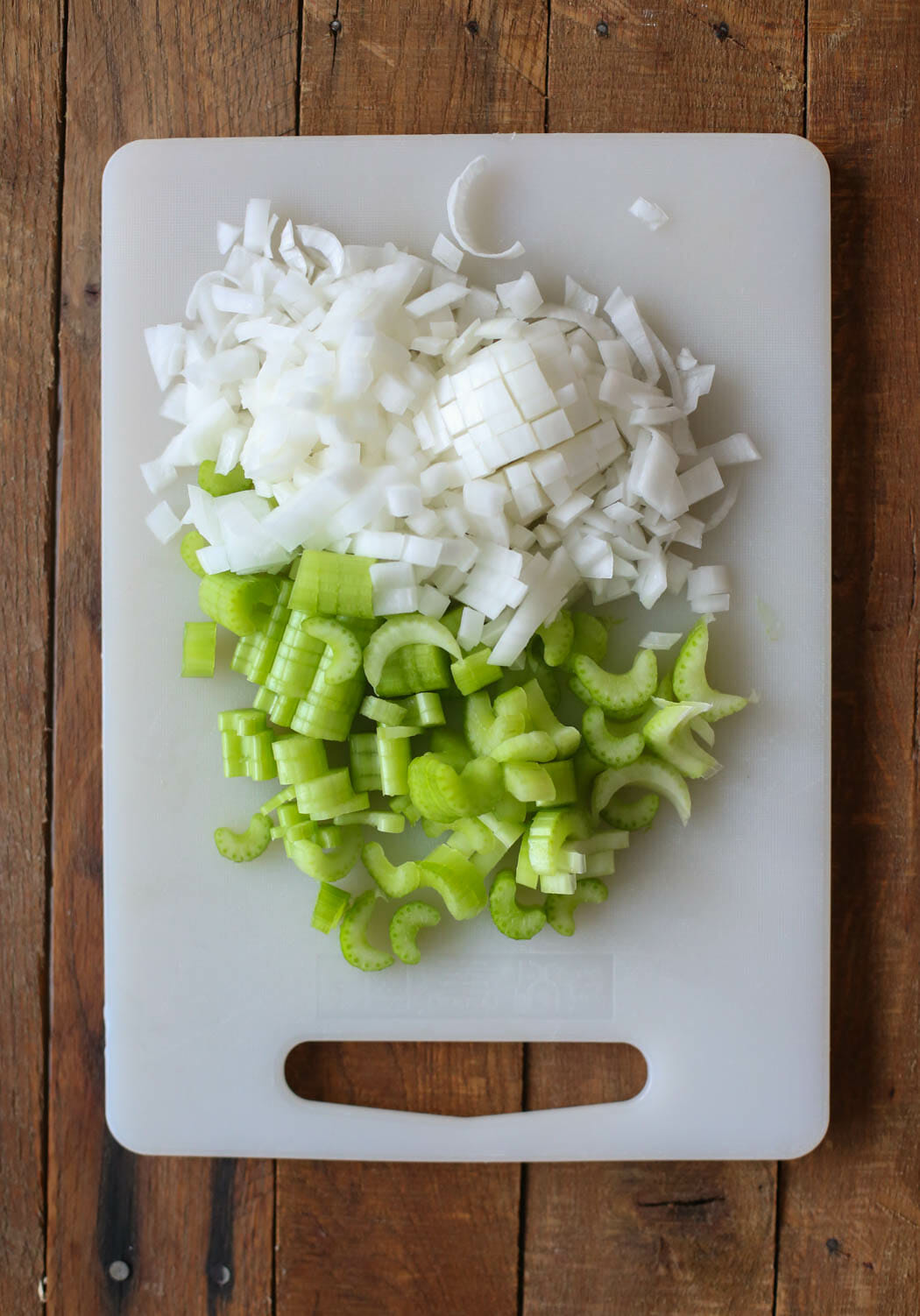 chopped onion and celery for Italian Sausage Thanksgiving Dressing