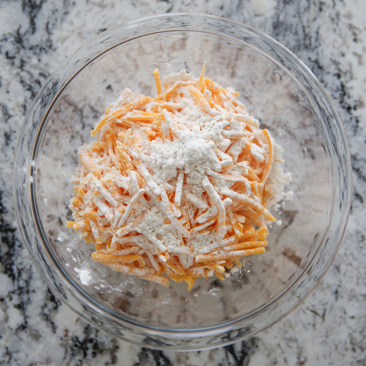 grated cheese with flour