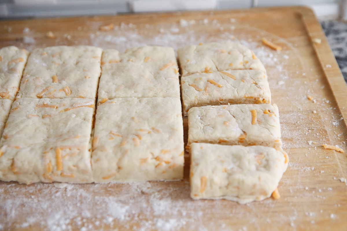 biscuit dough being cut