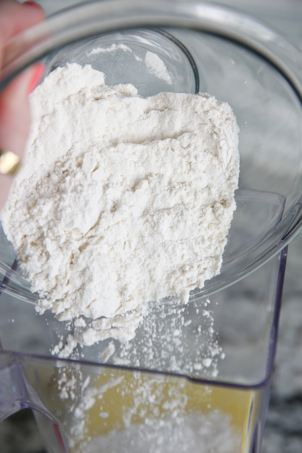 Pouring flour into blender