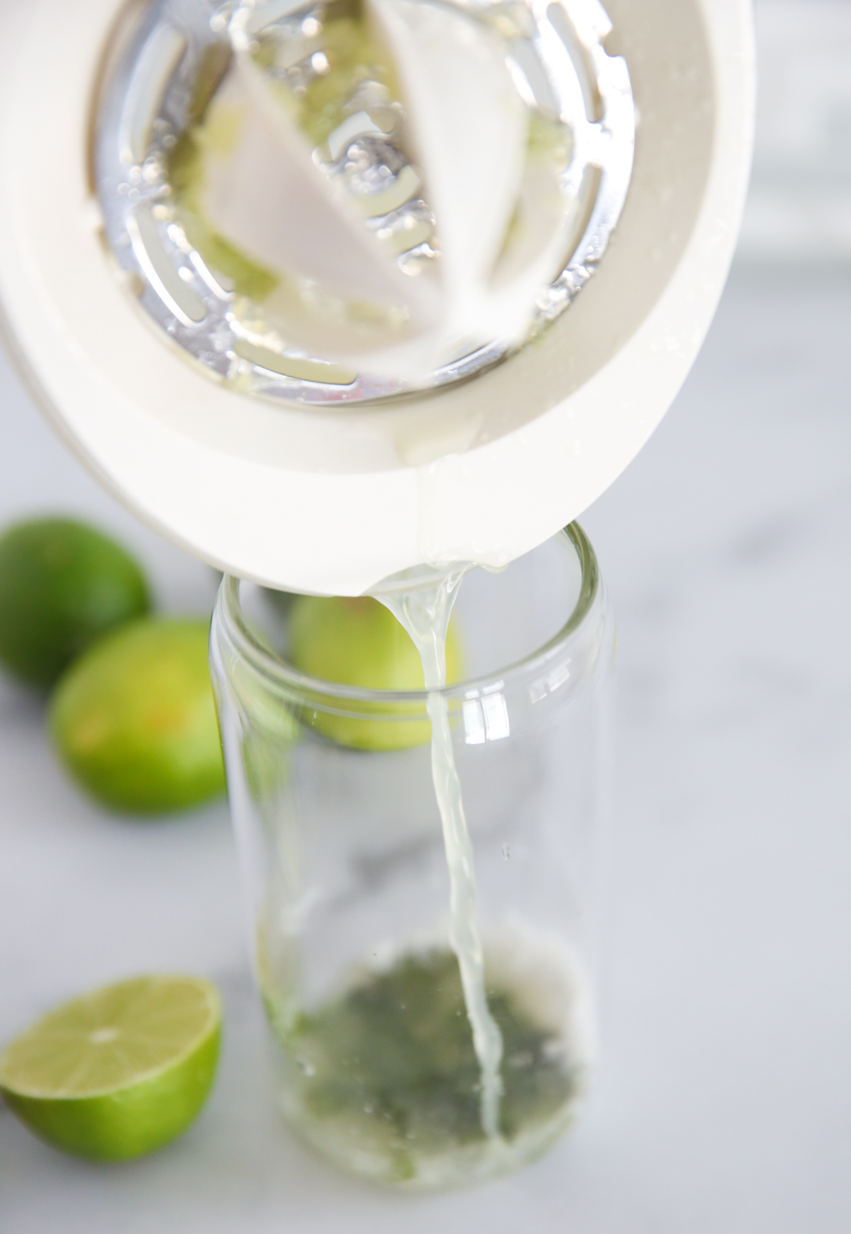 pouring sparkling water in a glass