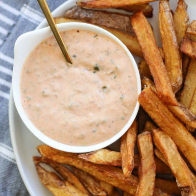 dipping sauce in a small bowl with fries