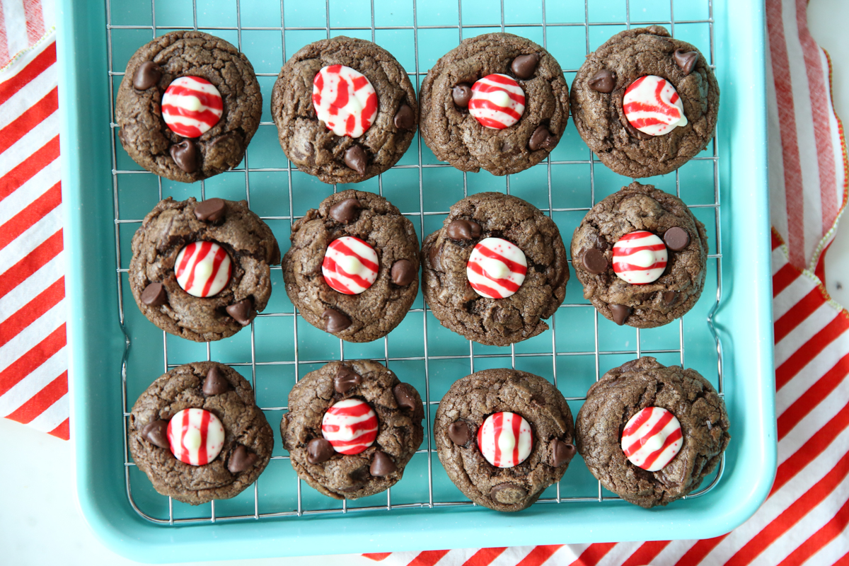 chocolate candy cane kiss cookies on a tray
