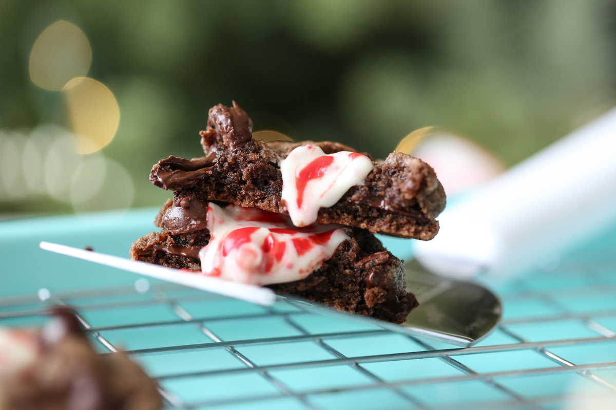 chocolate candy cane kiss cookies on a tray