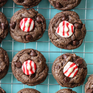 chocolate candy cane kiss cookies on a tray