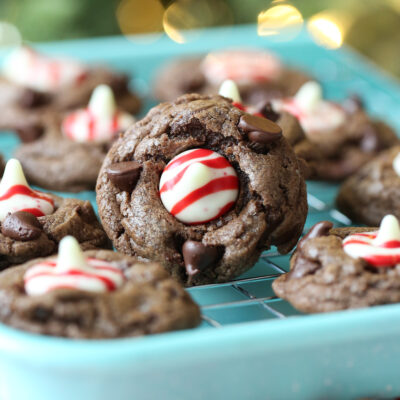 chocolate candy cane kiss cookies on a tray