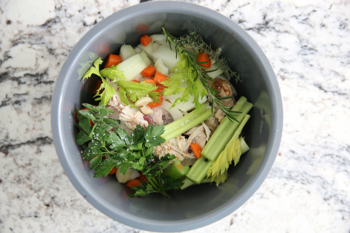 homemade chicken broth recipe ingredients in a pot