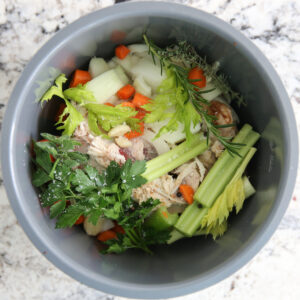 Homemade Chicken Broth ingredients in a pot