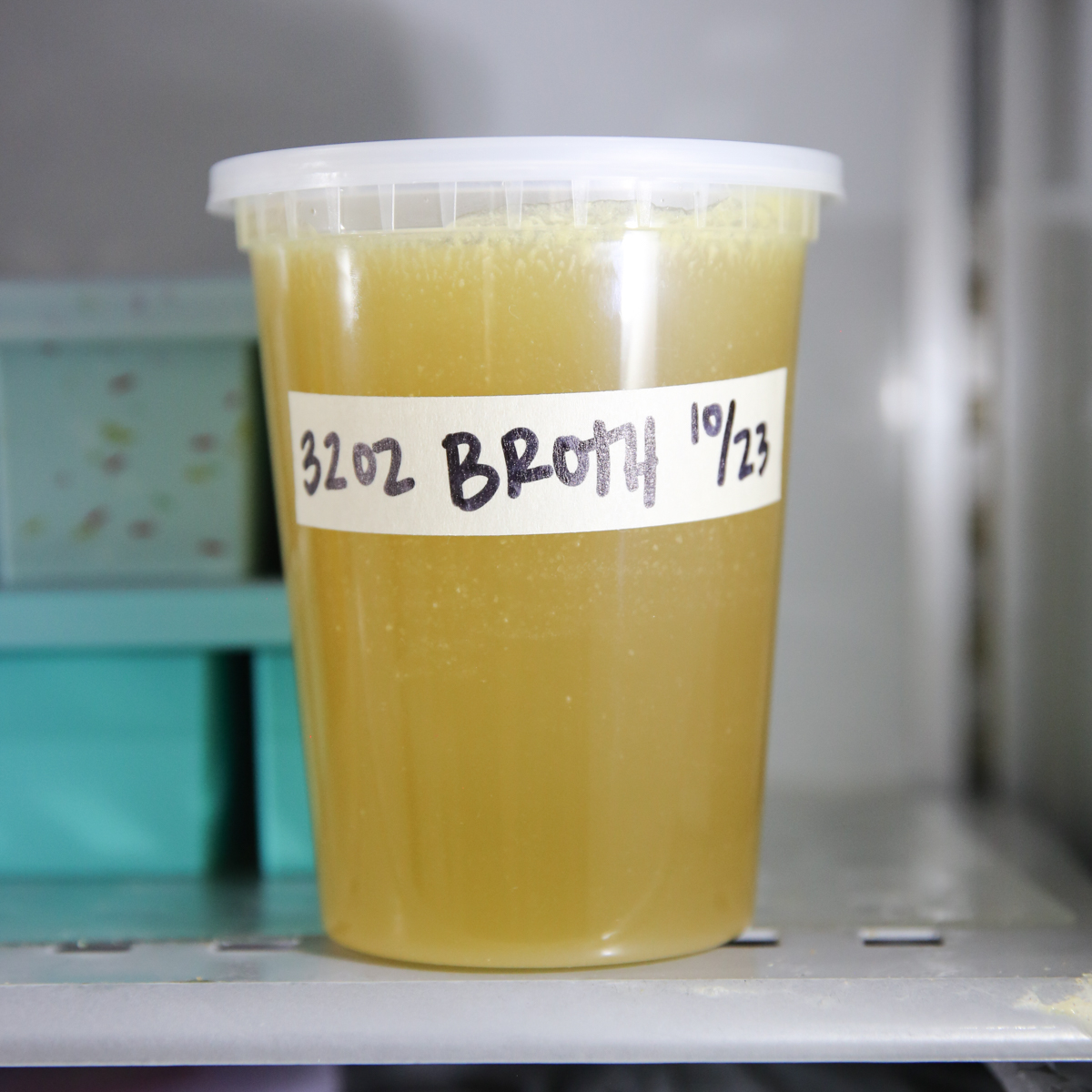 freezing chicken broth in labeled container