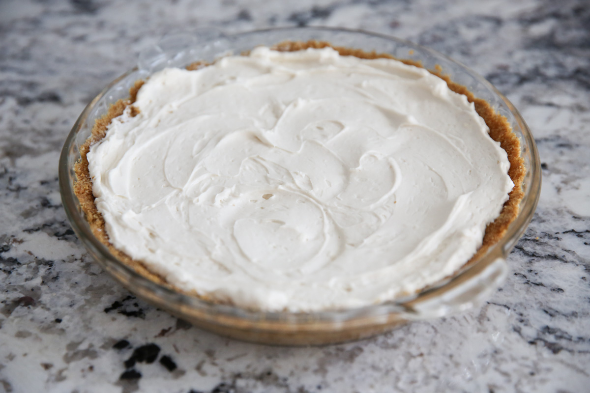 graham cracker pie crust filled witih cream