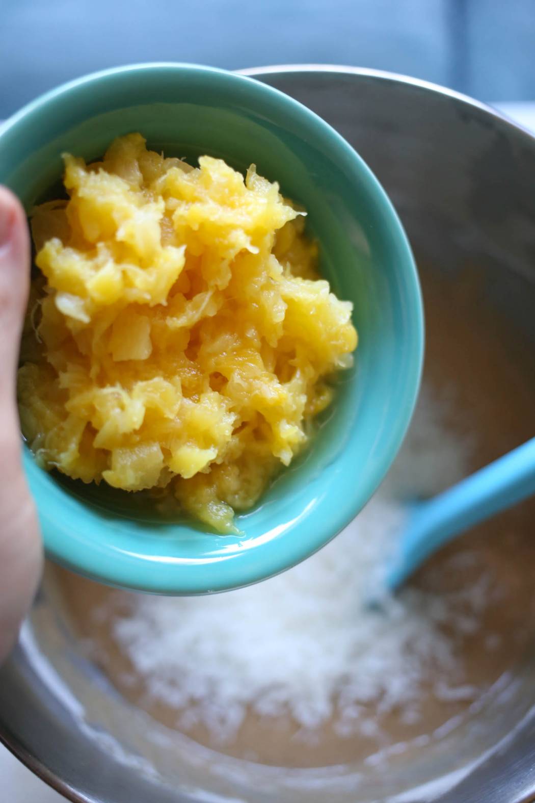 adding pineapple to carrot cake