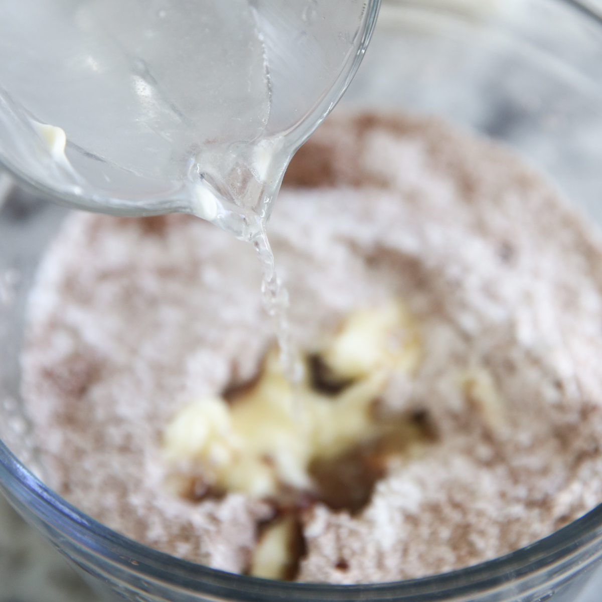 adding boiling water to icing