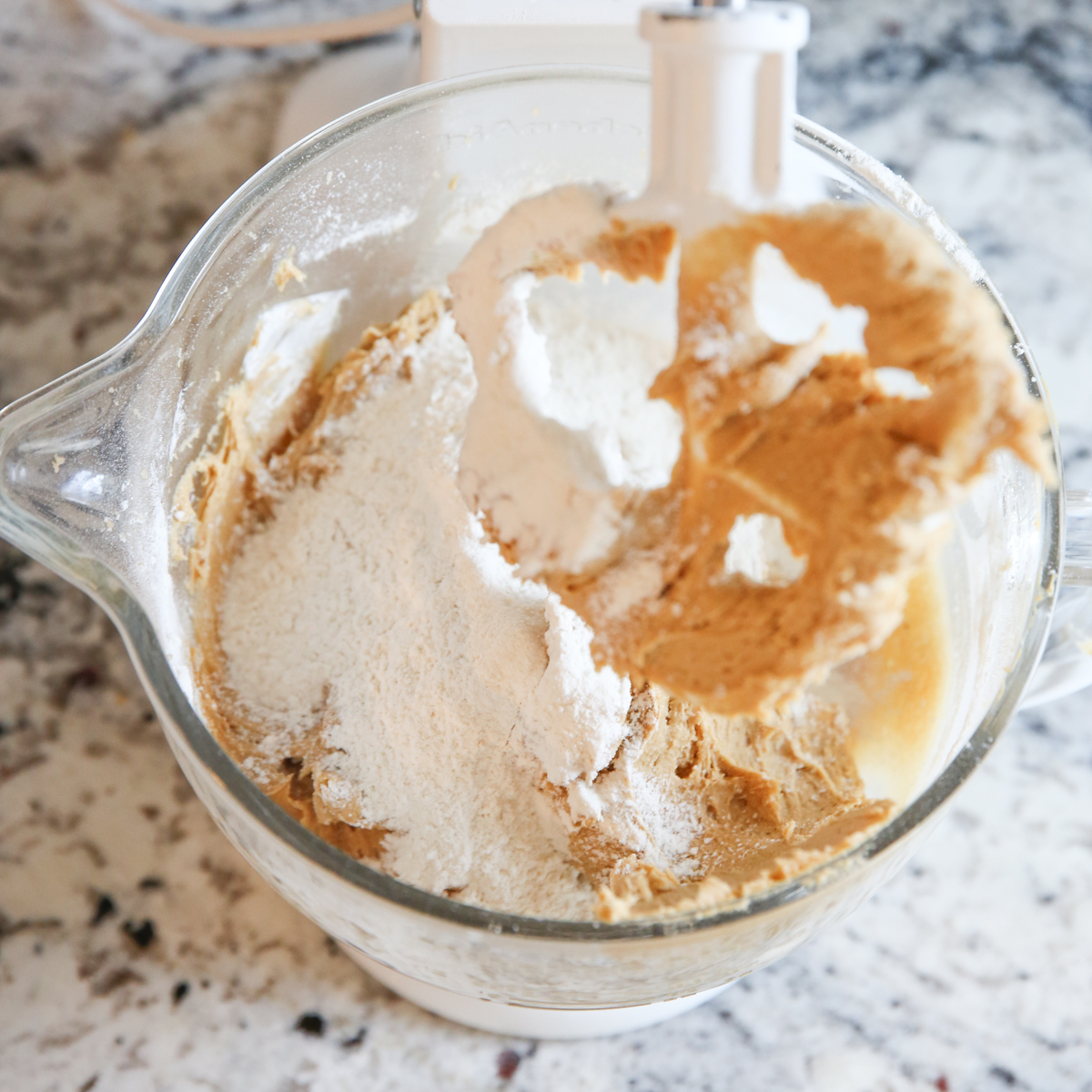 mixing dough in a mixing bowl