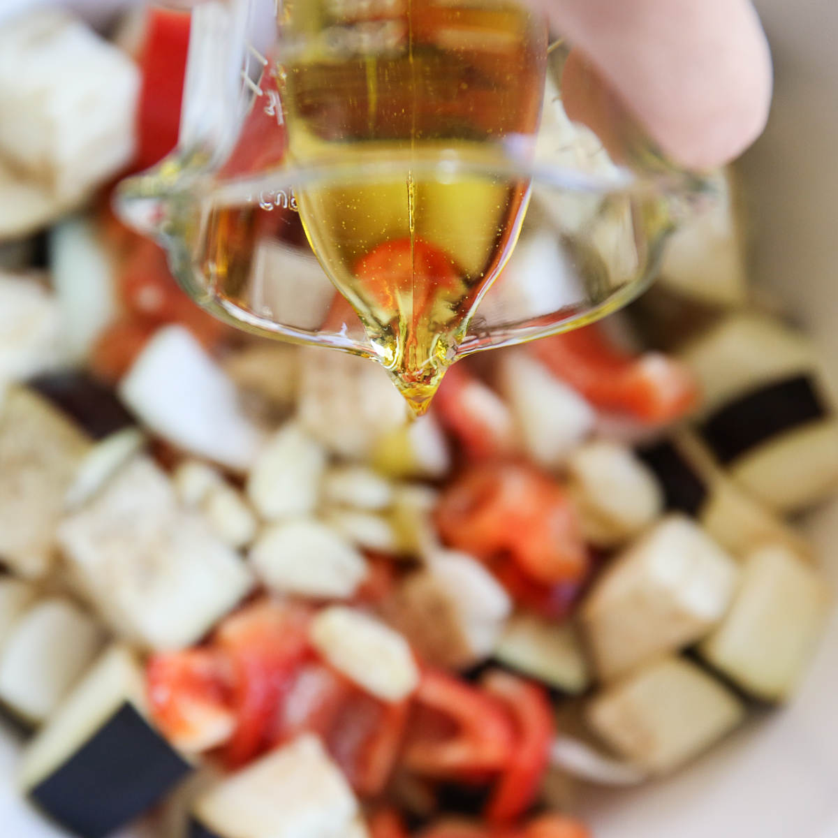 olive oil drizzled on roasted vegetables