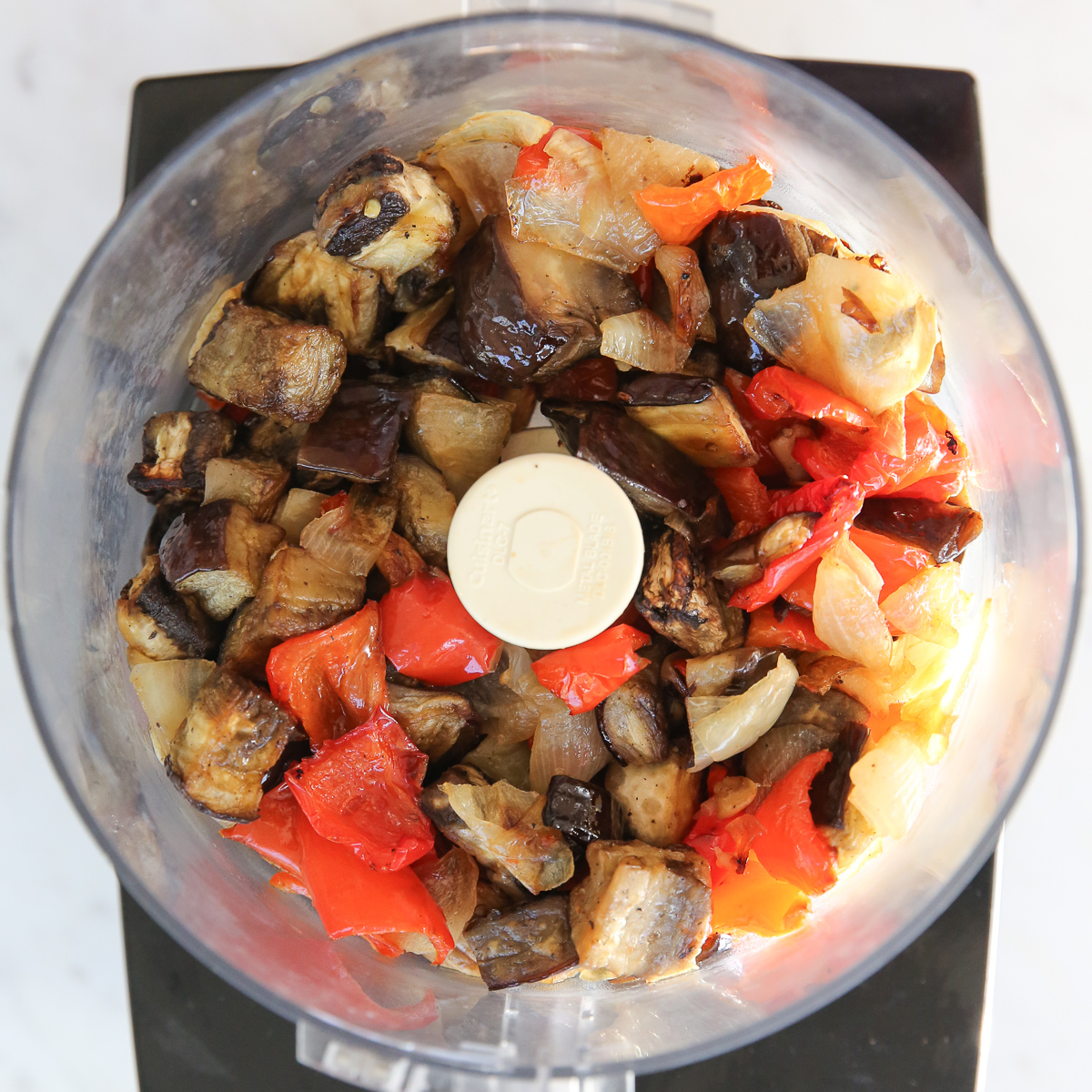 roasted vegetables in a food processor