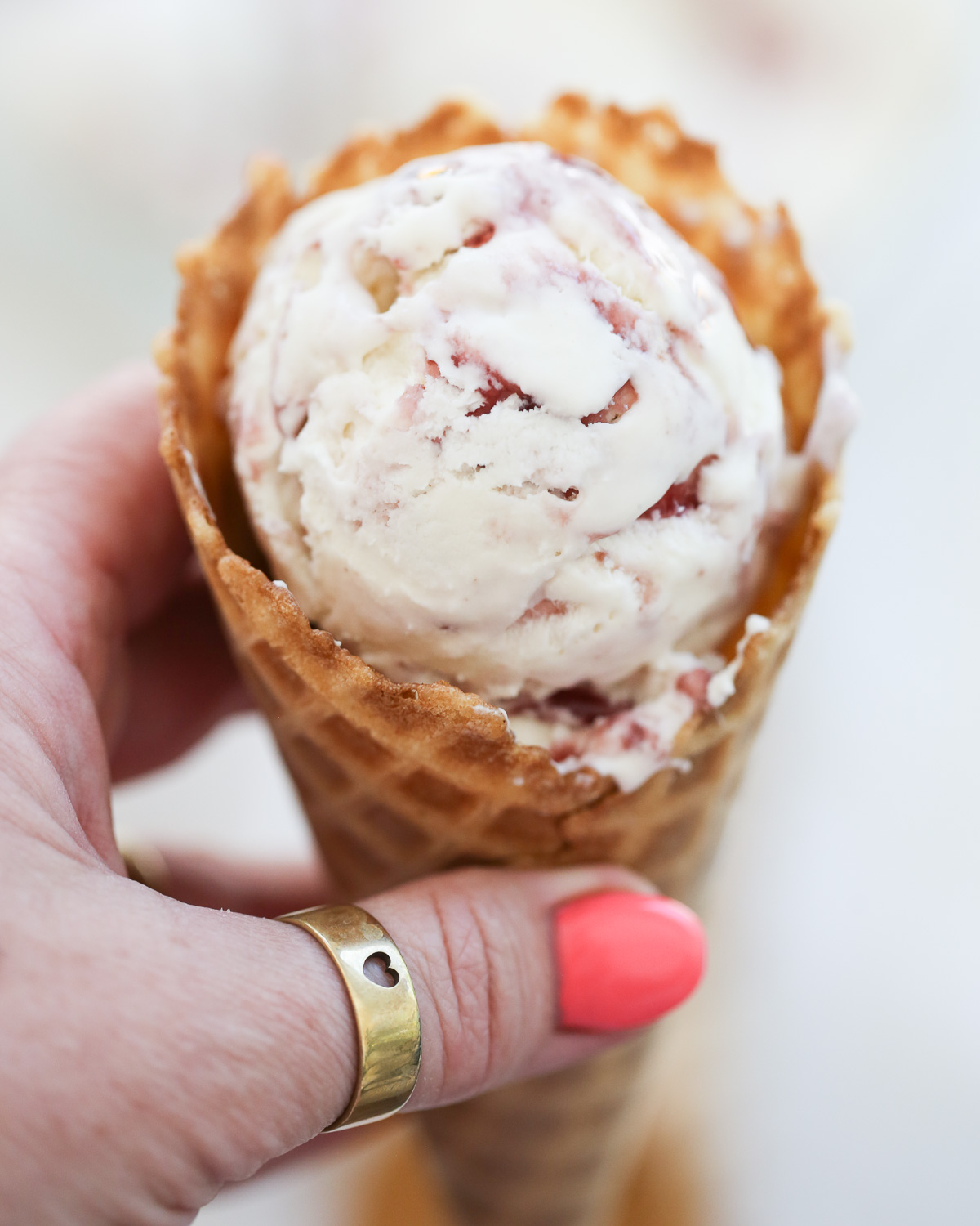 hand holding an ice cream cone