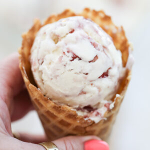 hand holding an ice cream cone