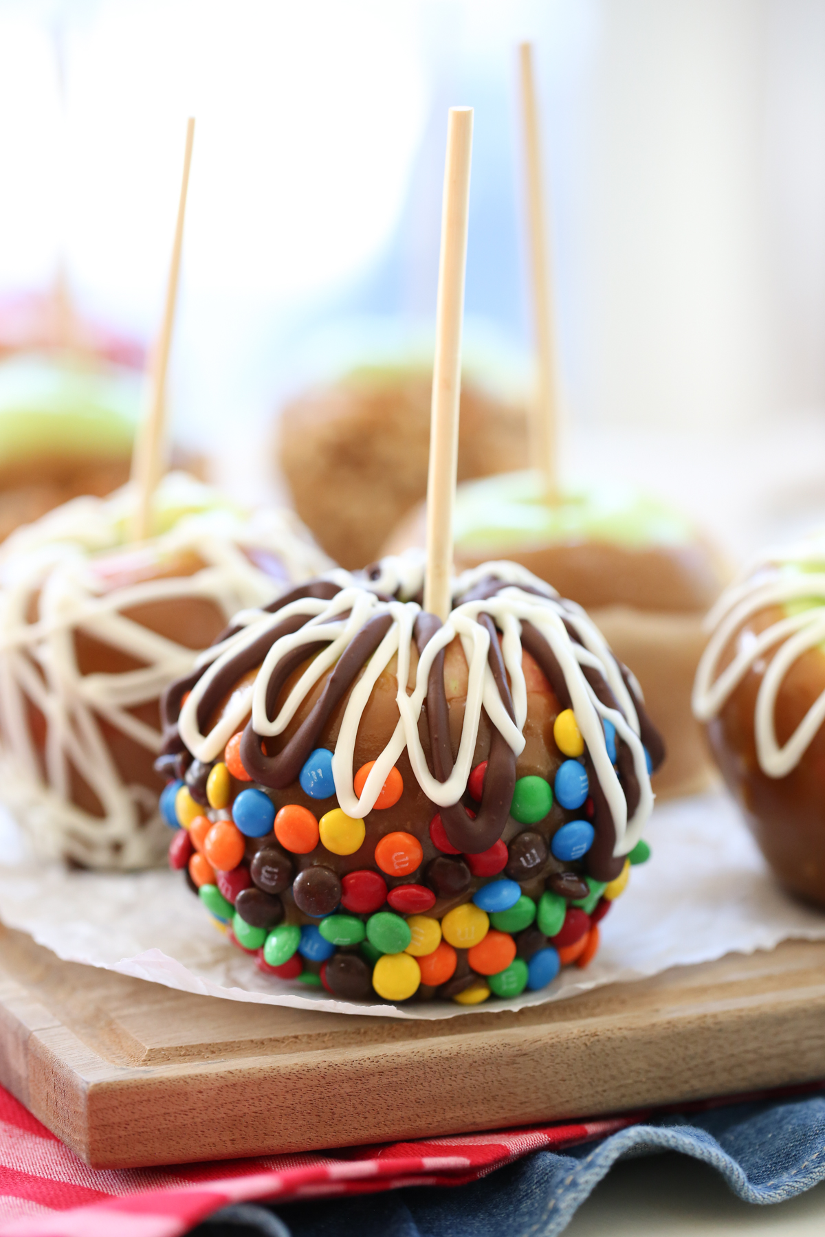 apple dipped in caramel with m and m's