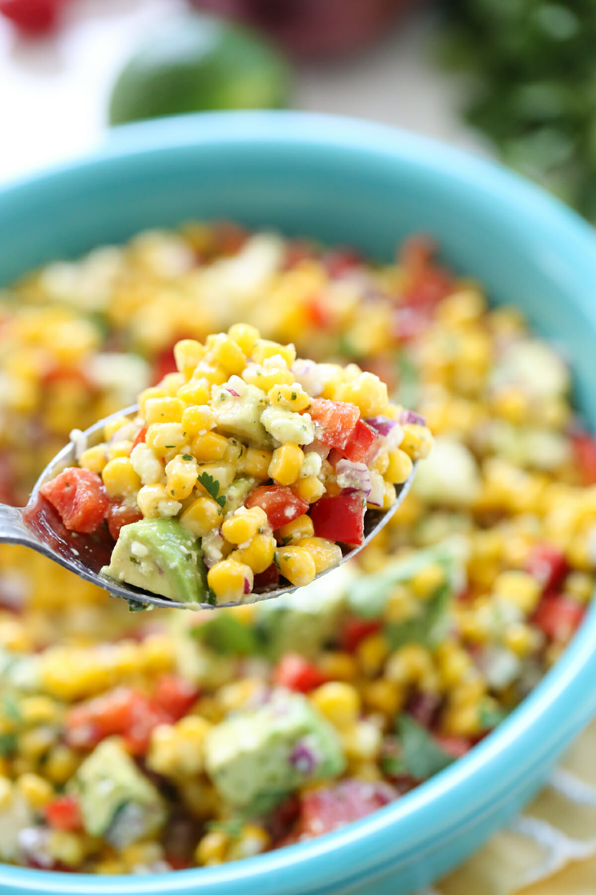 A spoonful of corn and vegetables