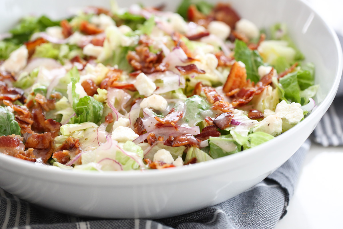 Salad in a white serving bowl