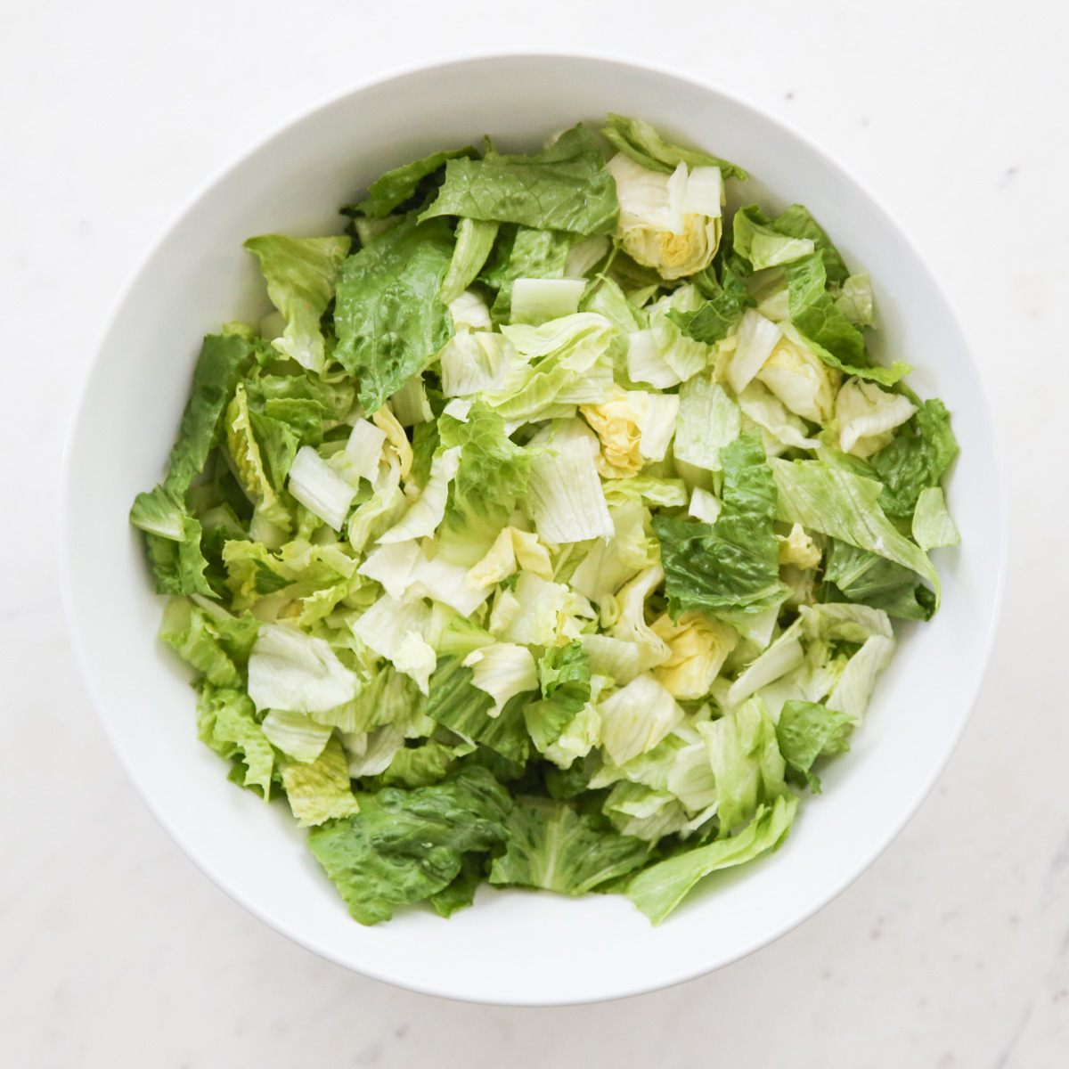 white bowl of lettuce