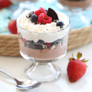 mini chocolate layered trifles with fruit on top