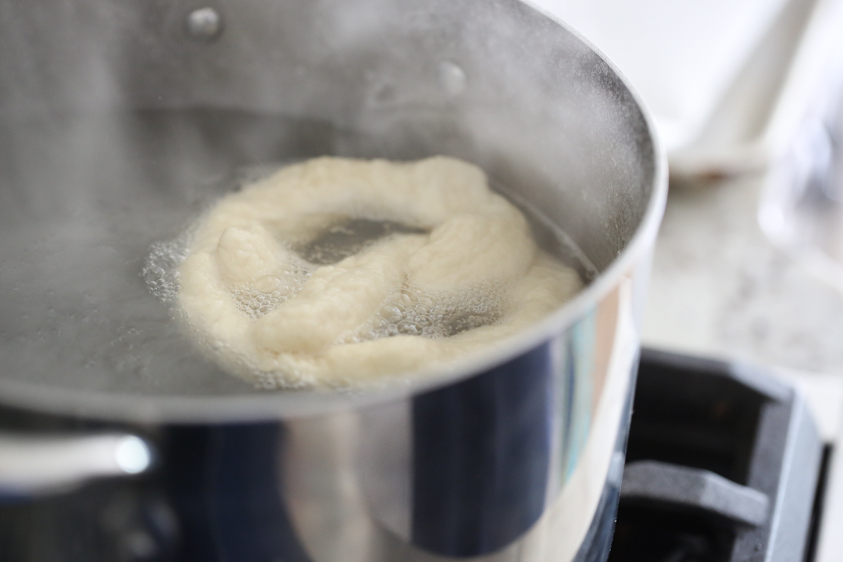 pretzel simmering in water bath
