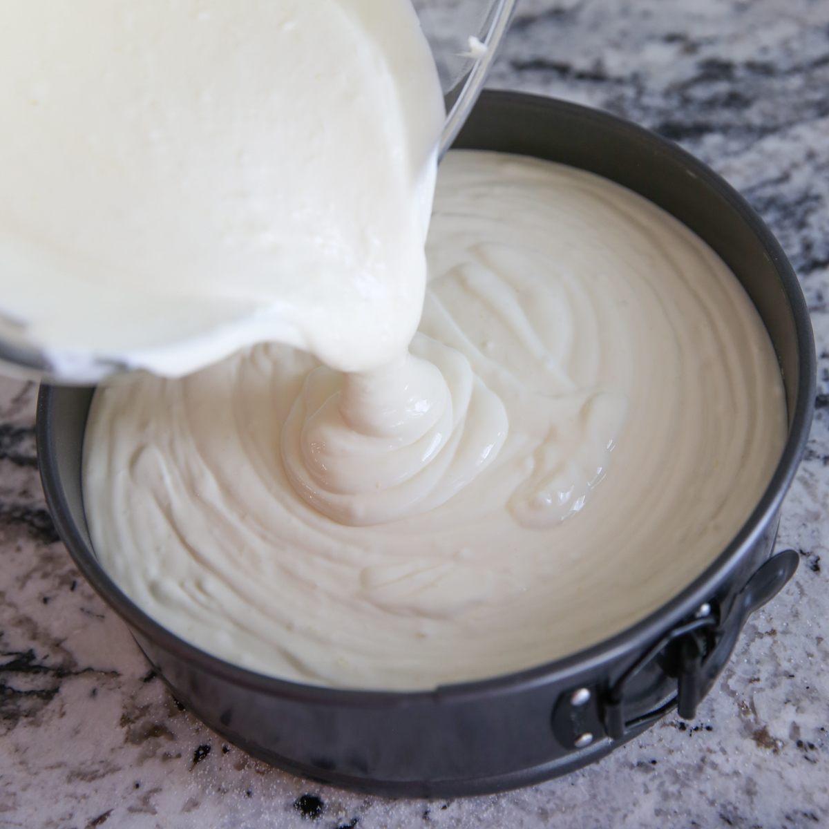 cheesecake batter in a springform pan