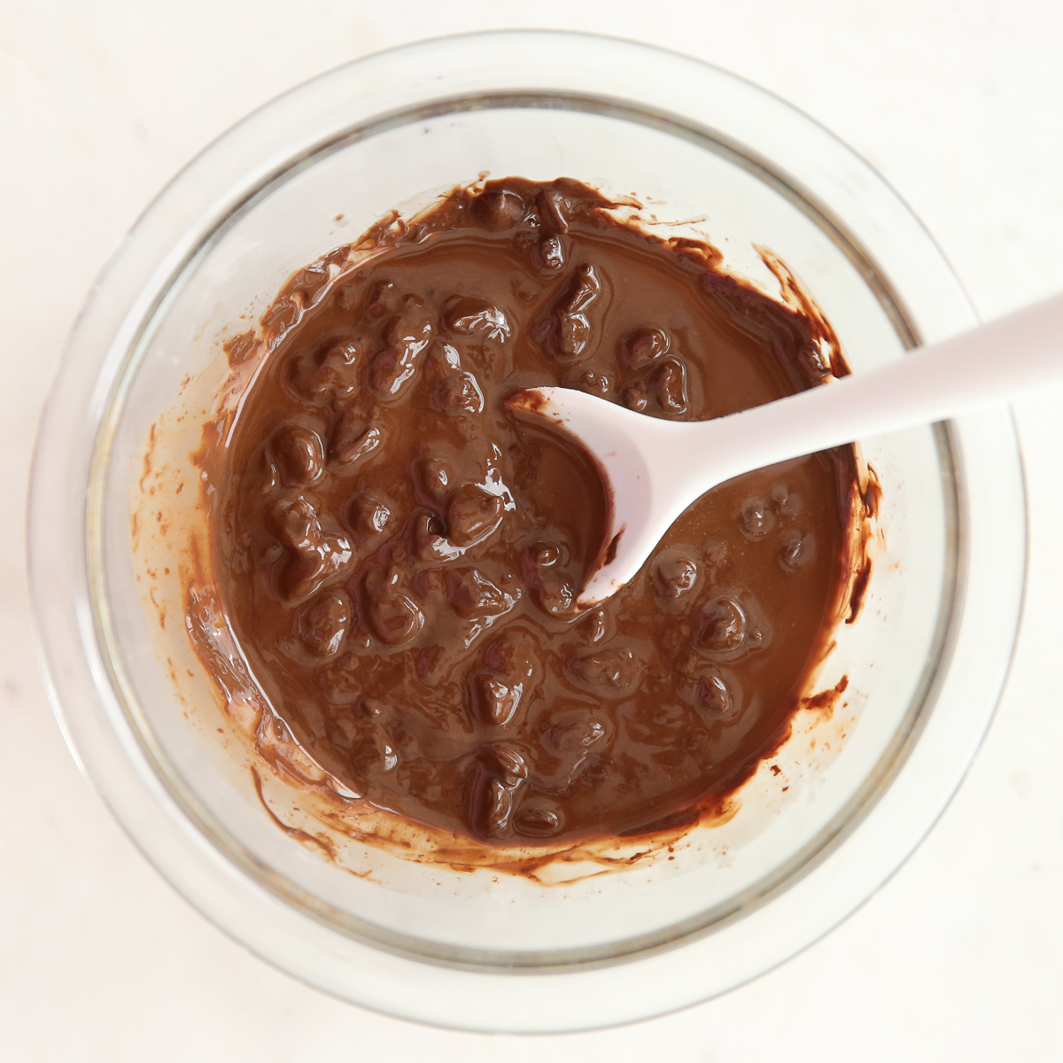 our best bites coconut oil and chocolate chips for magic shell topping